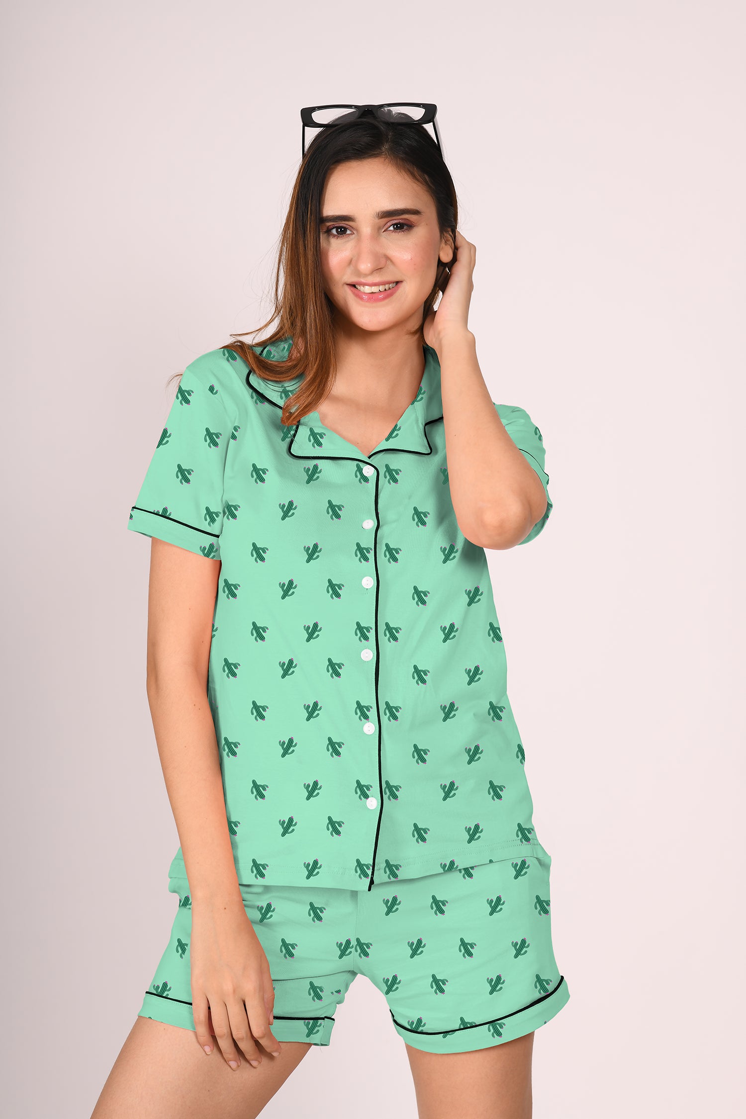 A young lady in stylish & comfortable green colour cactus print nightwear shorts set  for women by NapSotry