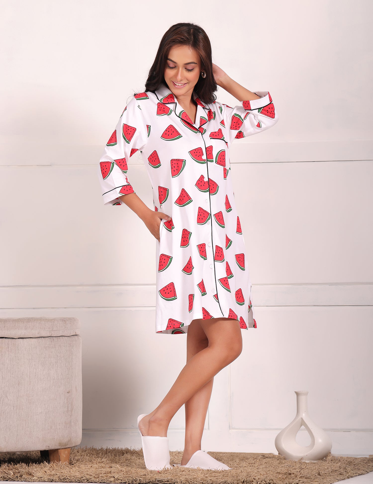 A young girl flaunting watermelon print shorts set nightwear by NapStory