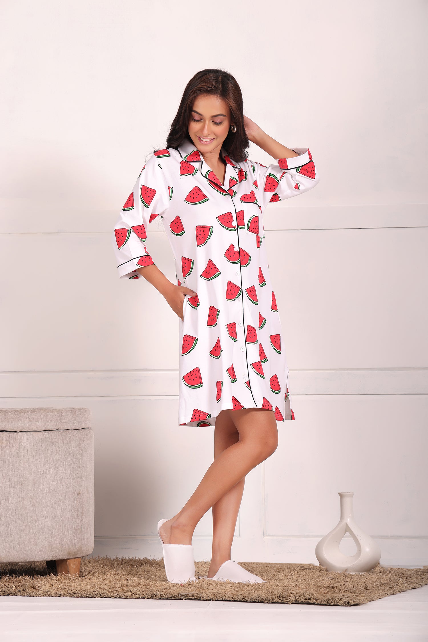 A young girl flaunting watermelon print shorts set nightwear by NapStory