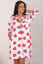 A cheerful girl posing while wearing a Watermelon Print Sleep Shirt nightwear by NapStory.