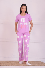 A young lady in Animal print bunny nightwear T-shirt and pyjama set by NapStory