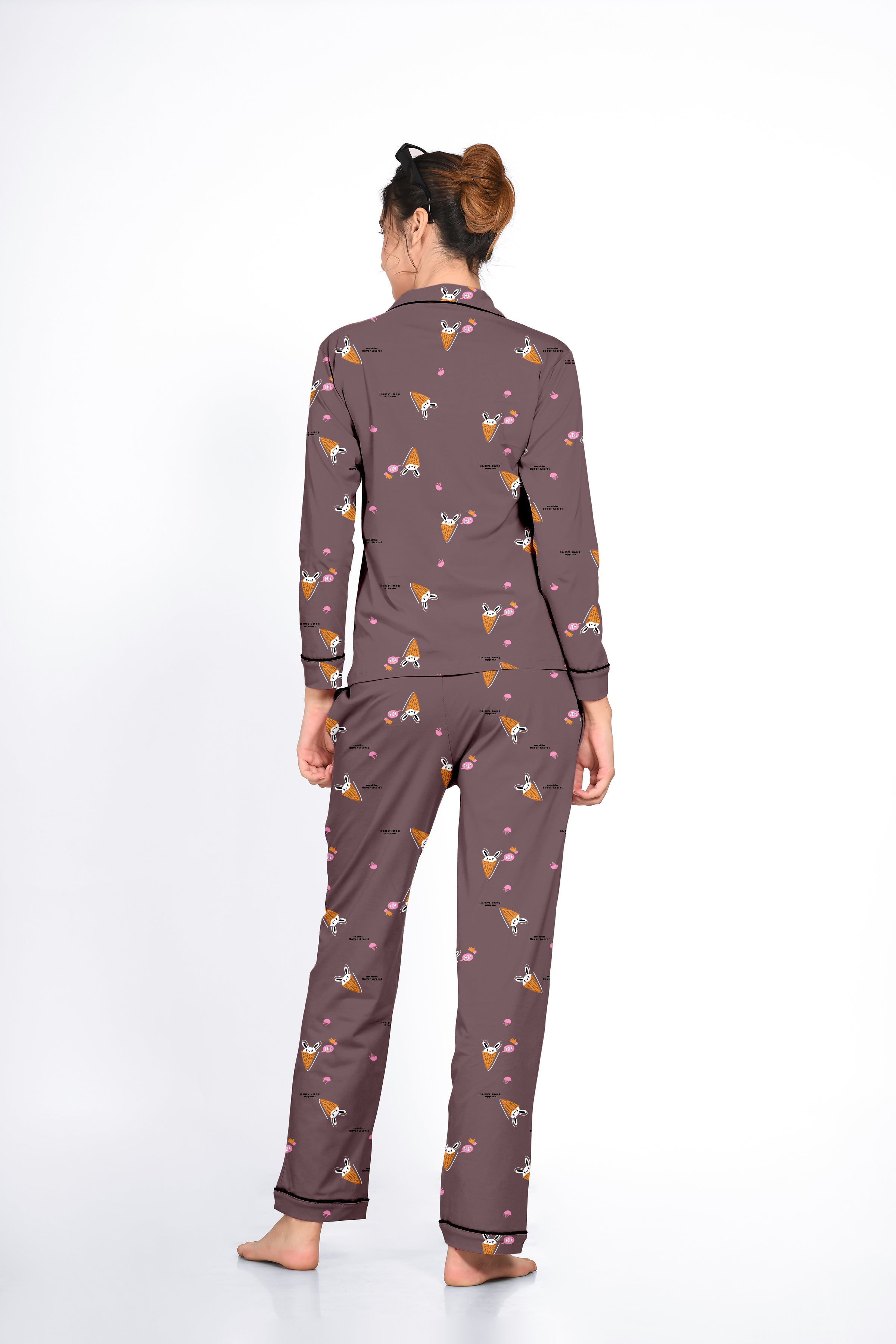 Woman in a brown Bunny Cone Print Full Sleeves Pyjama Set by NapStory, showing a relaxed back view.