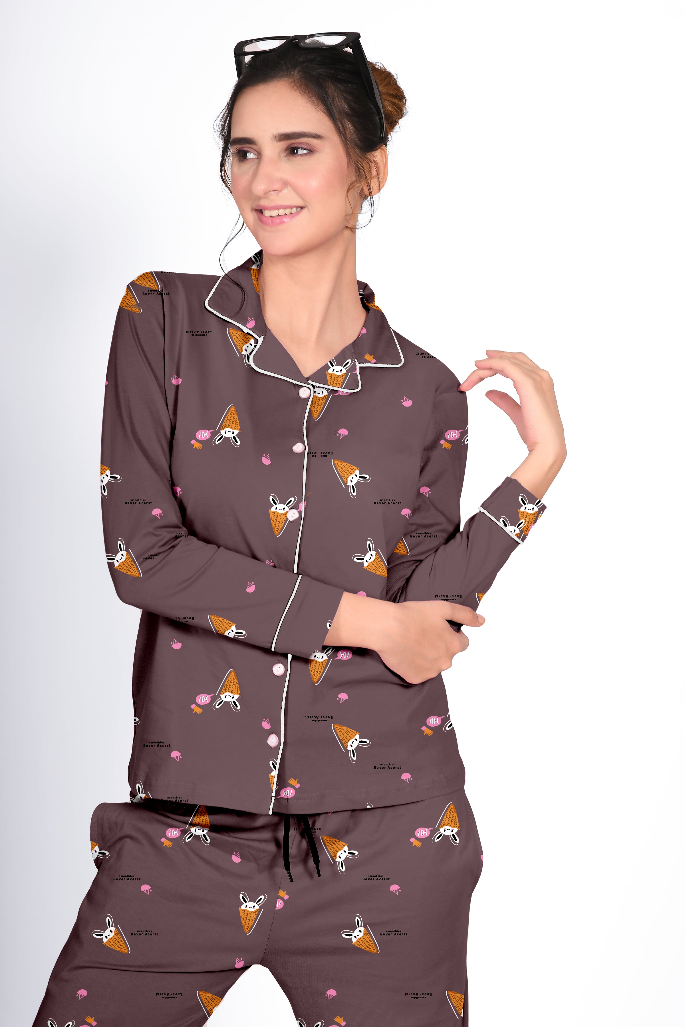 Woman in a brown Bunny Cone Print Full Sleeves Pyjama Set by NapStory, posing with a cheerful smile and a stylish look.