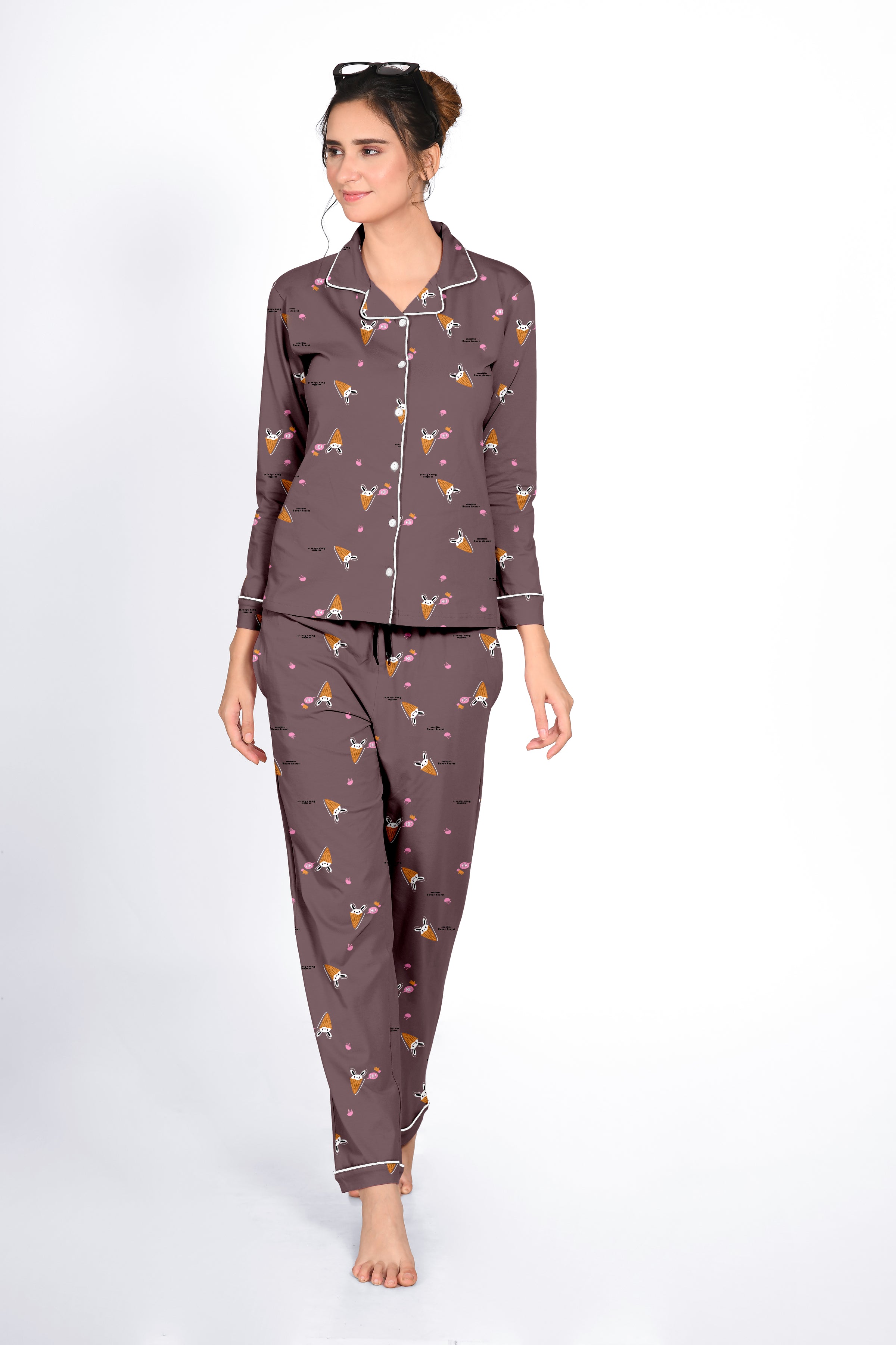 Lady in a brown Bunny Cone Print Full Sleeves Pyjama Set by NapStory, walking gracefully with a relaxed smile.