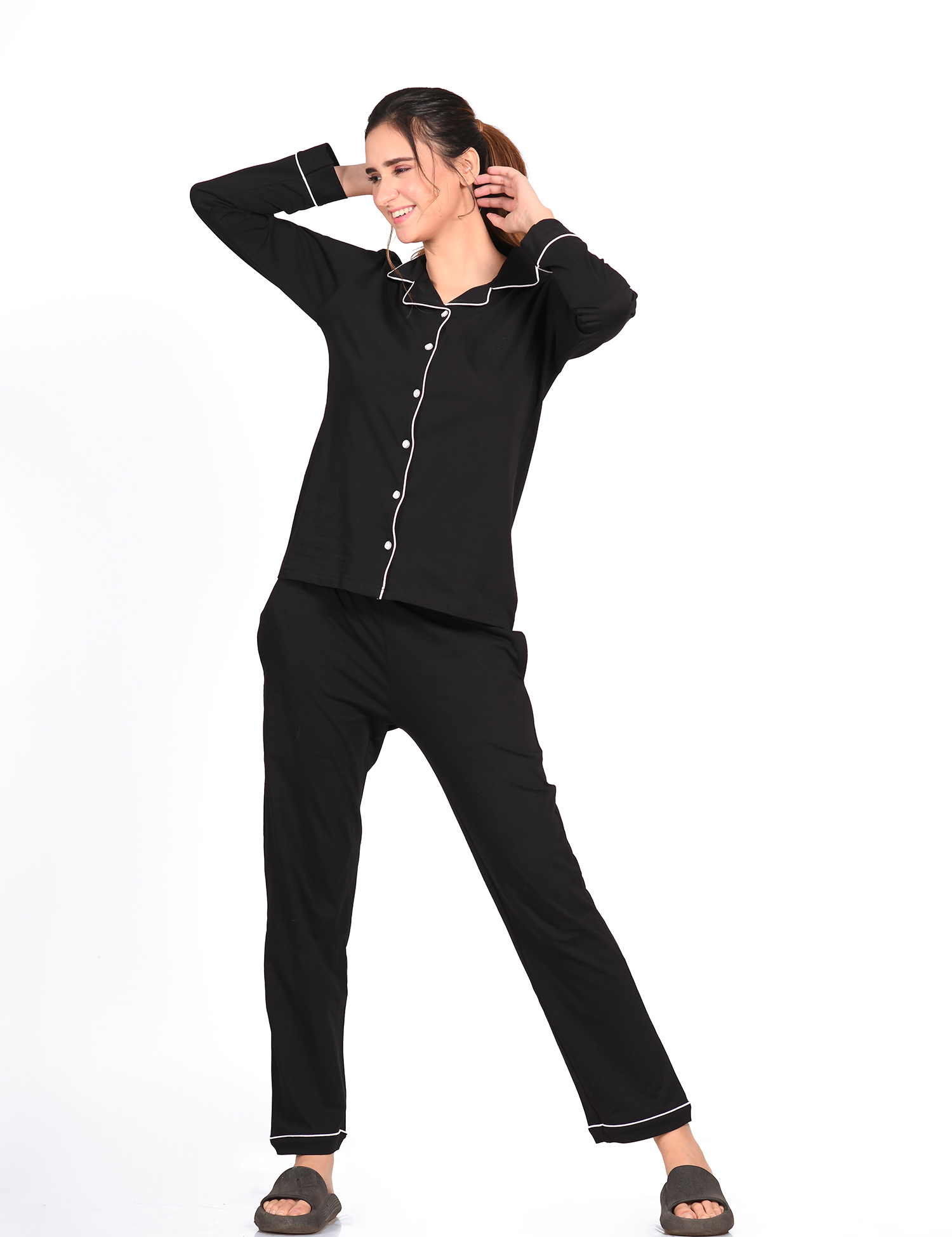 Lady showcasing a cosy 100% cotton black nightsuit set from Napstory, ideal for cold nights.