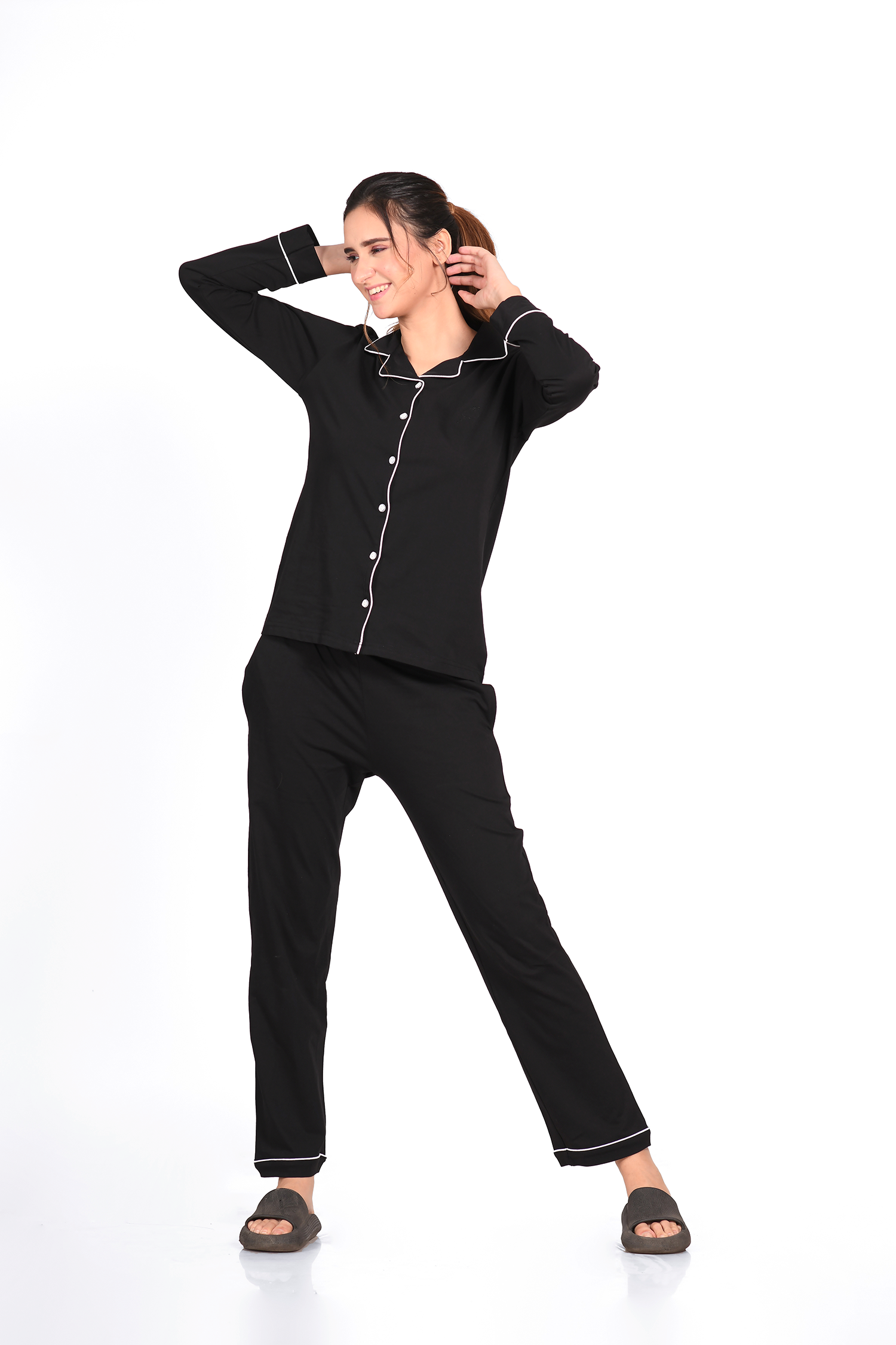 Lady showcasing a cosy 100% cotton black nightsuit set from Napstory, ideal for cold nights.