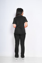 Back view of a woman in stylish and trendy solid black colour night suit/ pyjama and shirt set