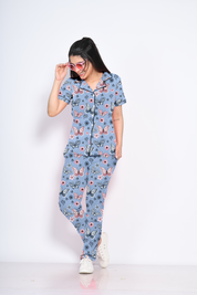 A young female flaunting Butterfly print nightwear pyjama set by NapStory