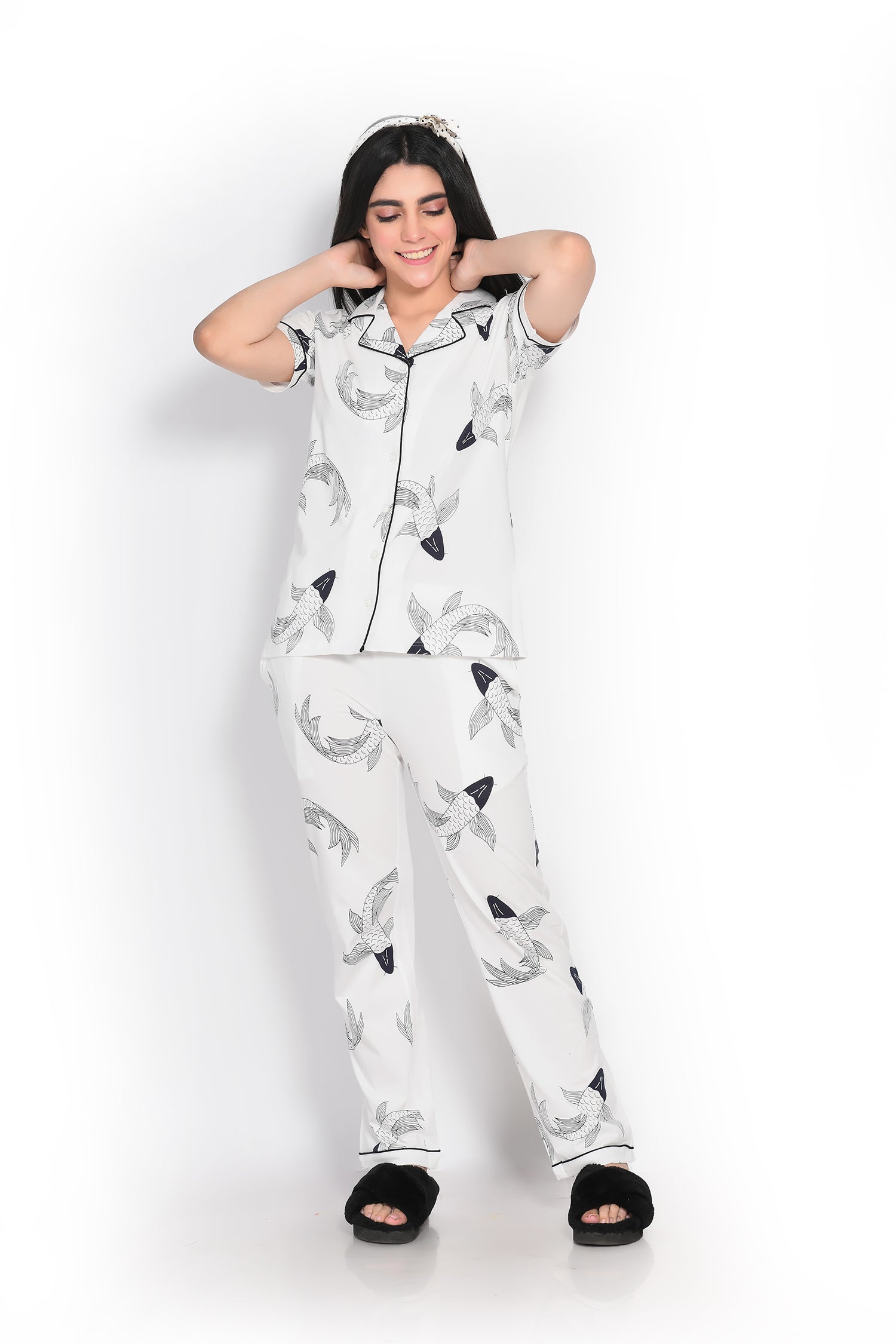 A young lady flaunting Fish print nightwear pyjama set by NapStory