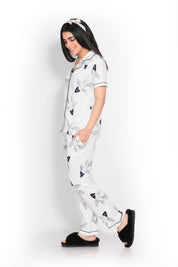 A young lady walking in Fish print nightwear pyjama set by NapStory