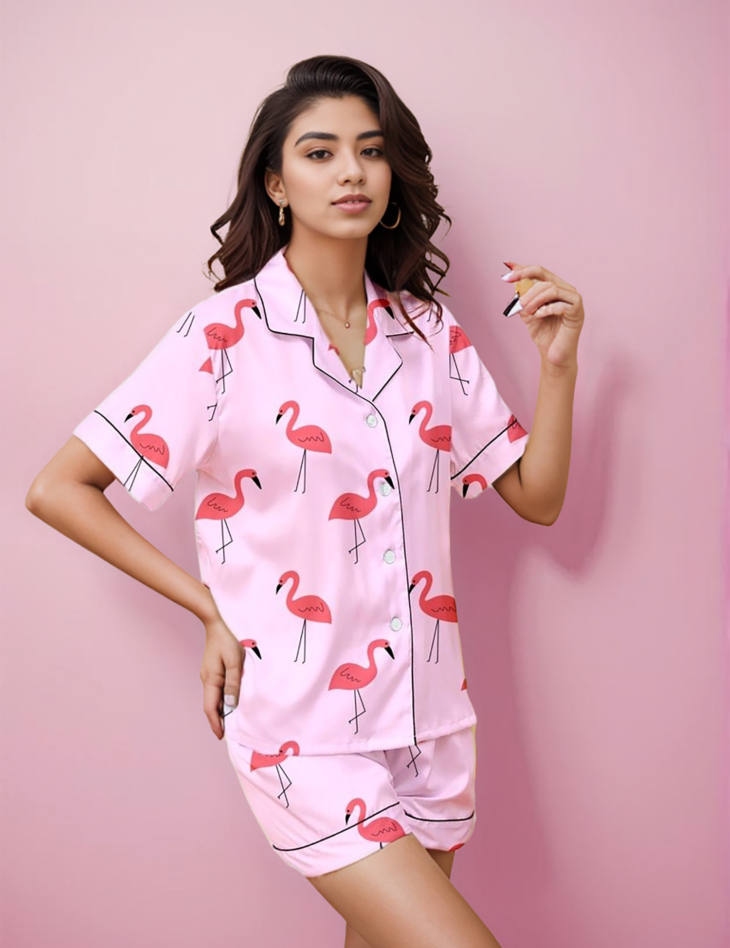 A young lady in Flamingo print shorts set by NapStory