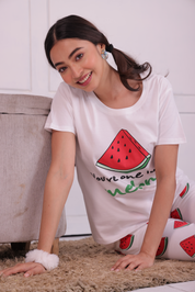 A Girl Sitting in a Melon Fruit Print Nightwear Pyjama & T-shirt Set by Napstory